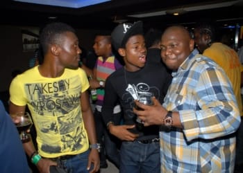 Manager Youth segment Etisalat Nigeria, Idiare Atimomo (Right) poses with some of the Nigerian Idol contestants at the Eviction Party