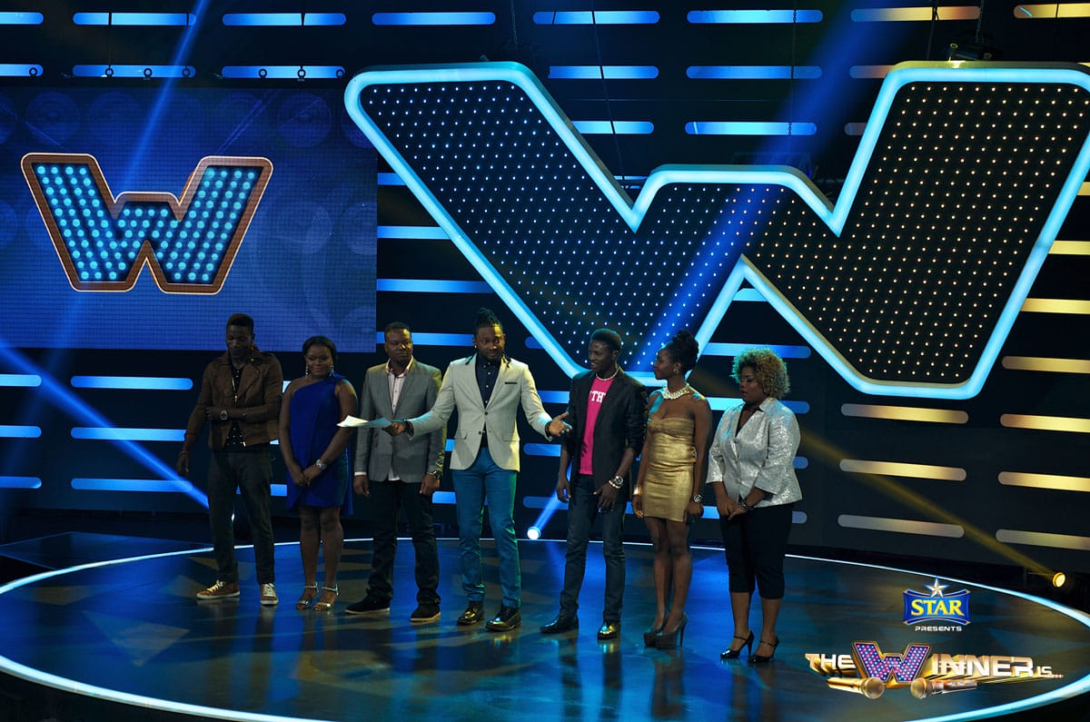 All contestants on stage with Uti Nwachukwu, Host