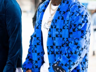 PARIS, FRANCE - JANUARY 15: Rapper Pop Smoke, wearing a blue Off-White coat, is seen outside the Off-White show during the Paris Fashion Week - Menswear F/W 2020-2021 on January 15, 2020 in Paris, France. (Photo by Claudio Lavenia/Getty Images)